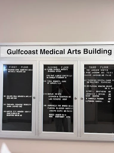 Gulfcoast Medical Arts Building directory board listing medical offices and providers on multiple floors